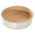 Nonstick 9-inch round layer cake pan, beige interior and white exterior with rim