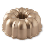 Bronze-gold bundt pan with ridged fluted ring mold and side handles